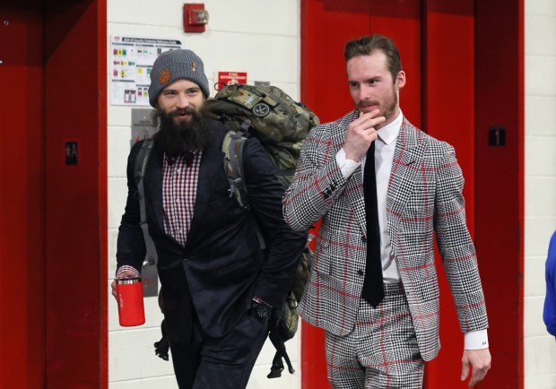 From left, Brent Burns and Andrei Svechnikov of the Carolina Hurricanes arrive to play against the Florida Panthers in Game 2 of the Eastern Conference Final of the 2025 Stanley Cup Playoffs at Lenovo Center on May 22, 2025 in Raleigh, North Carolina. (Photo by Bruce Bennett/Getty Images)