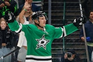 Dallas Stars center Roope Hintz (24) celebrates a goal by center Wyatt Johnston during the...