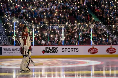 Colorado Avalanche goaltender Antoine Bibeau stands before 2019 game.