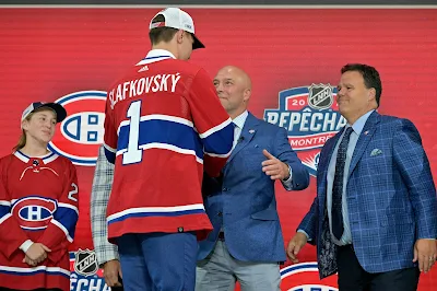 Montreal Canadiens general manager Kent Hughes and vice president Jeff Gorton at 2022 NHL Entry Draft.