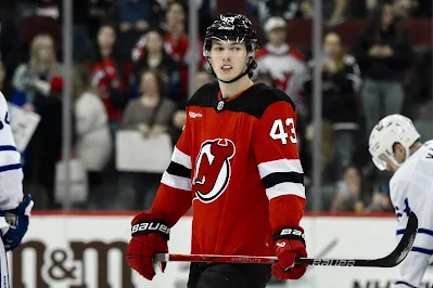 Luke Hughes, NJ Devils on ice during warmup