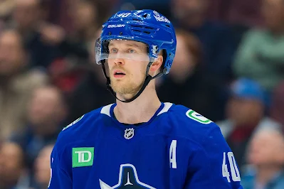 Vancouver Canucks forward Elias Pettersson reacts during 2025 game. Vancouver Canucks forward Elias Pettersson reacts during 2025 game.