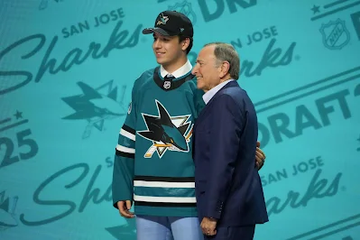 Michael Misa at the NHL Draft, with Commissioner Gary Bettman