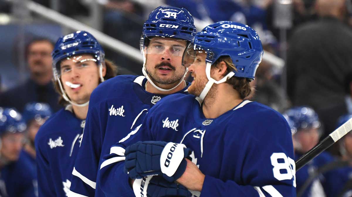Toronto Maple Leafs forward Auston Matthews (34) speaks with forward William Nylander (88) as forward Matthew Knies (23) looks on in the first period against the Nashville Predators at Scotiabank Arena.