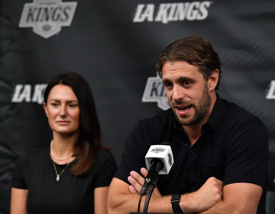 King star Anze Kopitar, accompanied by wife, Ines, announces he will retire at the conclusion of the 2025-26 season during a press conference on Sept. 18, 2025. NHLI via Getty Images