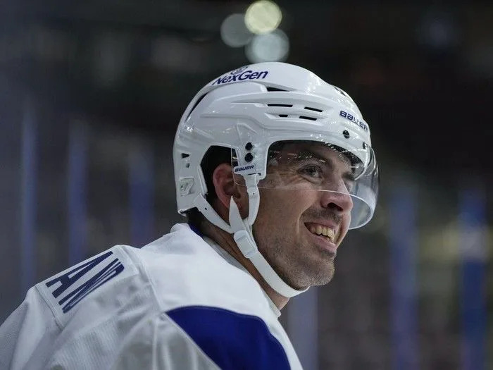  Vancouver Canucks’ Conor Garland smiles during the opening day of the NHL hockey team’s training camp, in Penticton, B.C., on Thursday, Sept. 18, 2025.