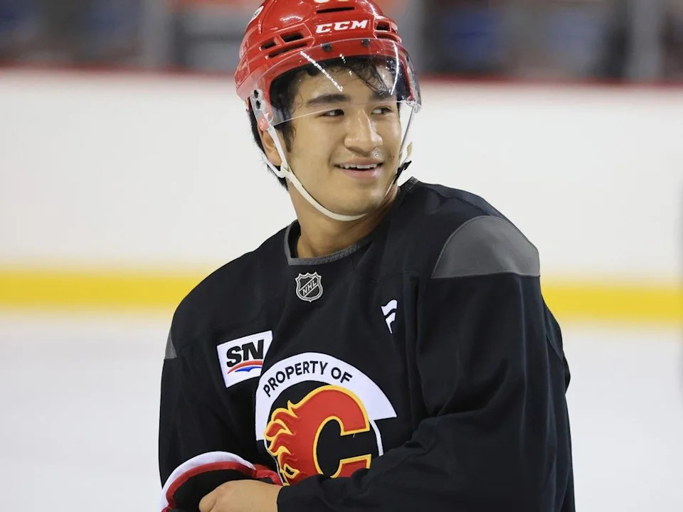 Calgary Flames forward Zayne Parekh smiles during the first day of training camp at the Scotiabank Saddledome on Thursday, September 18, 2025.Gavin Young/Postmedia