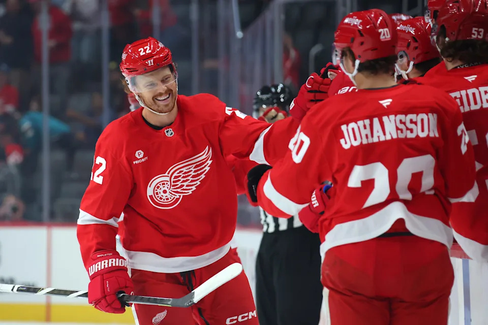 Mason Appleton of the Detroit Red Wings celebrates his first period goal with teammates while playing the Buffalo Sabres at Little Caesars Arena in Detroit on Thursday, Sept. 25, 2025.