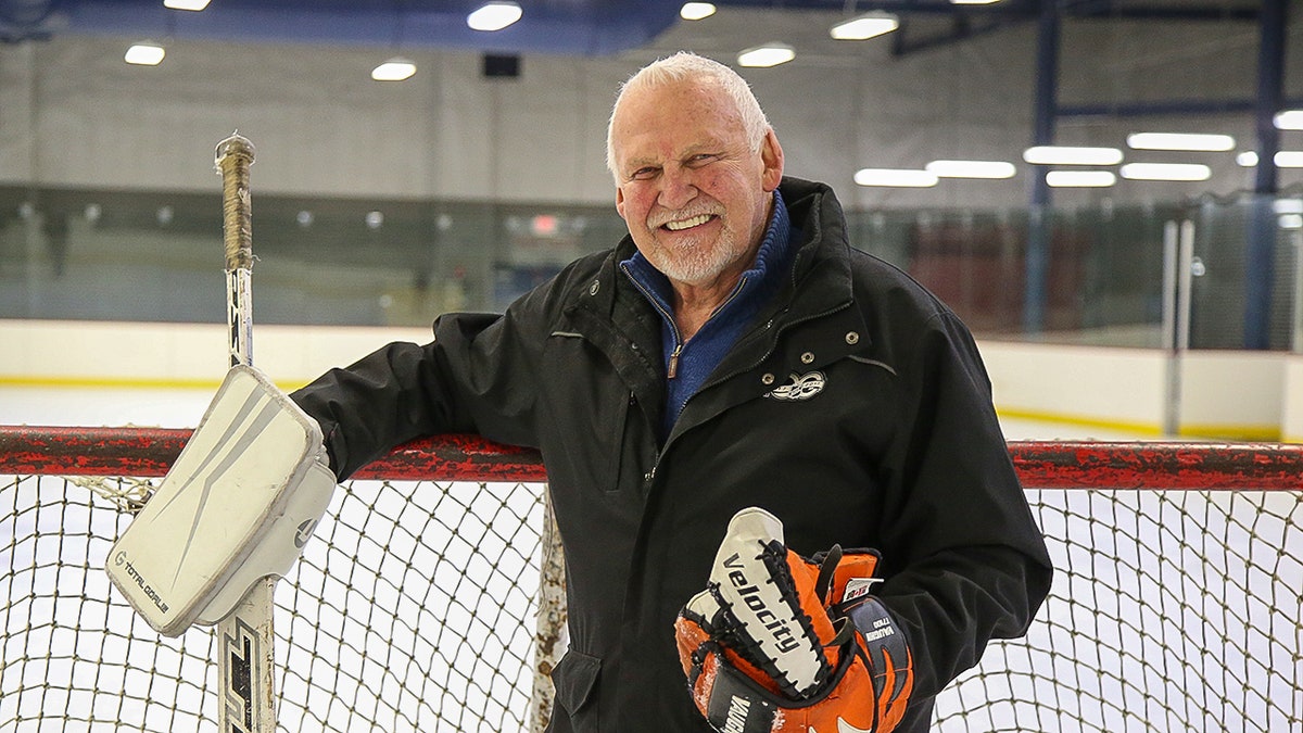 Bernie Parent poses on ice