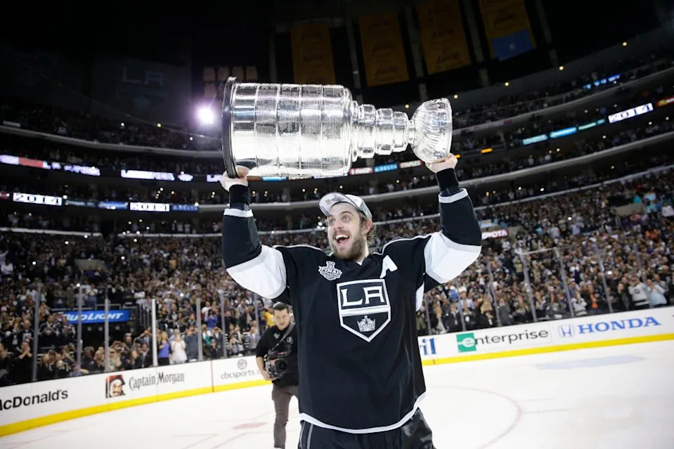 Anze Kopitar carries the Stanley Cup after the Kings beat the Rangers at home in Game 5 on June 13, 2014. AP