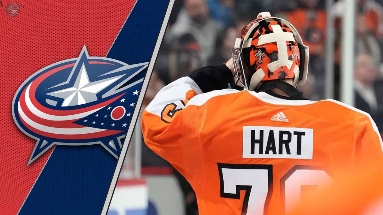 Goaltender Carter Hart in his Philadelphia Flyers jersey, looking focused during a game, as he's rumored to be signing with the Columbus Blue Jackets.
