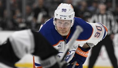 Edmonton Oilers right wing Corey Perry (90) watches a face off against the Los Angeles Kings during the third period of an NHL hockey game in Los Angeles, Saturday, April 5, 2025. (AP Photo/Alex Gallardo)