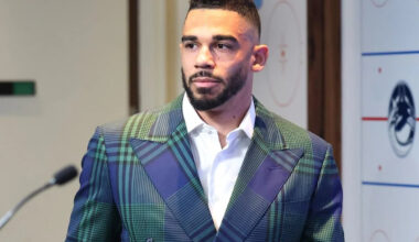 Evander Kane pumps the tires of Elias Pettersson