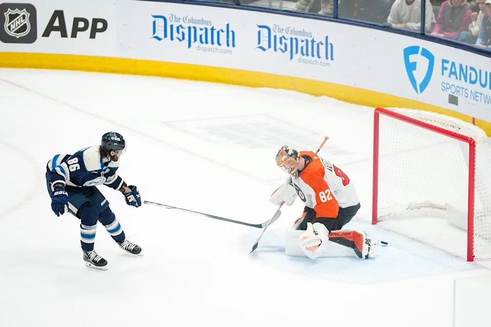 Columbus Blue Jackets right wing Kirill Marchenko (86) scores the game-winning goal past Philadelphia Flyers goaltender Ivan Fedotov (82) during the shootout in the NHL hockey game at Nationwide Arena in Columbus on Jan. 14, 2025. The Blue Jackets won 3-2.