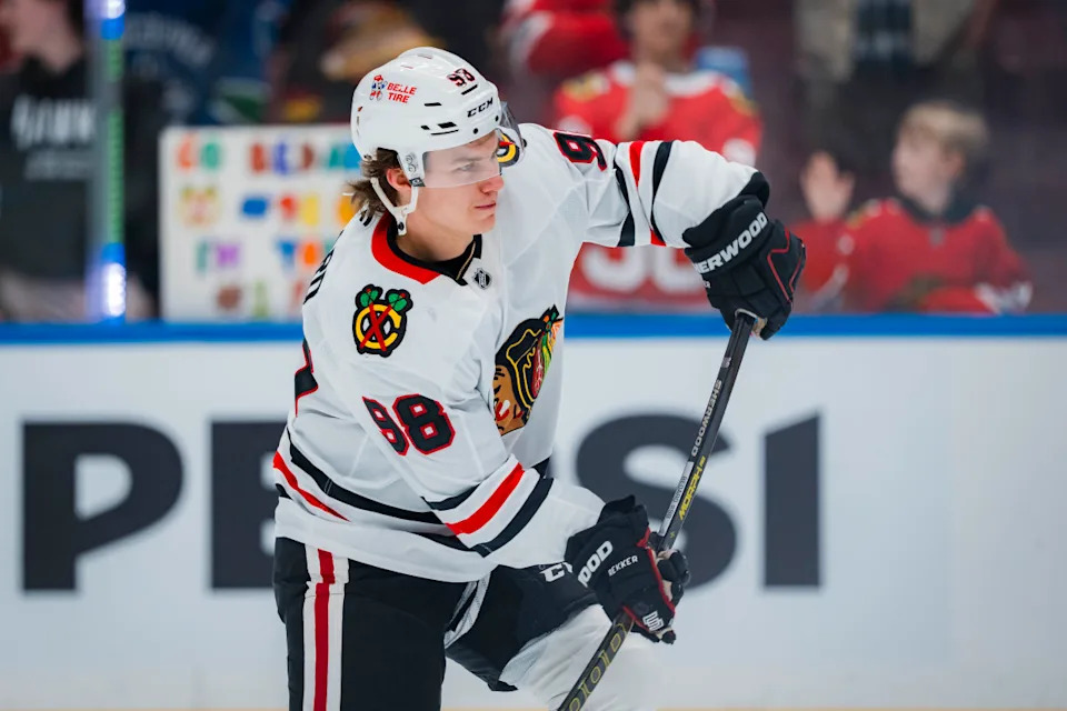 Chicago Blackhawks forward Connor Bedard (98) shoots during warm-ups.Bob Frid-Imagn Images