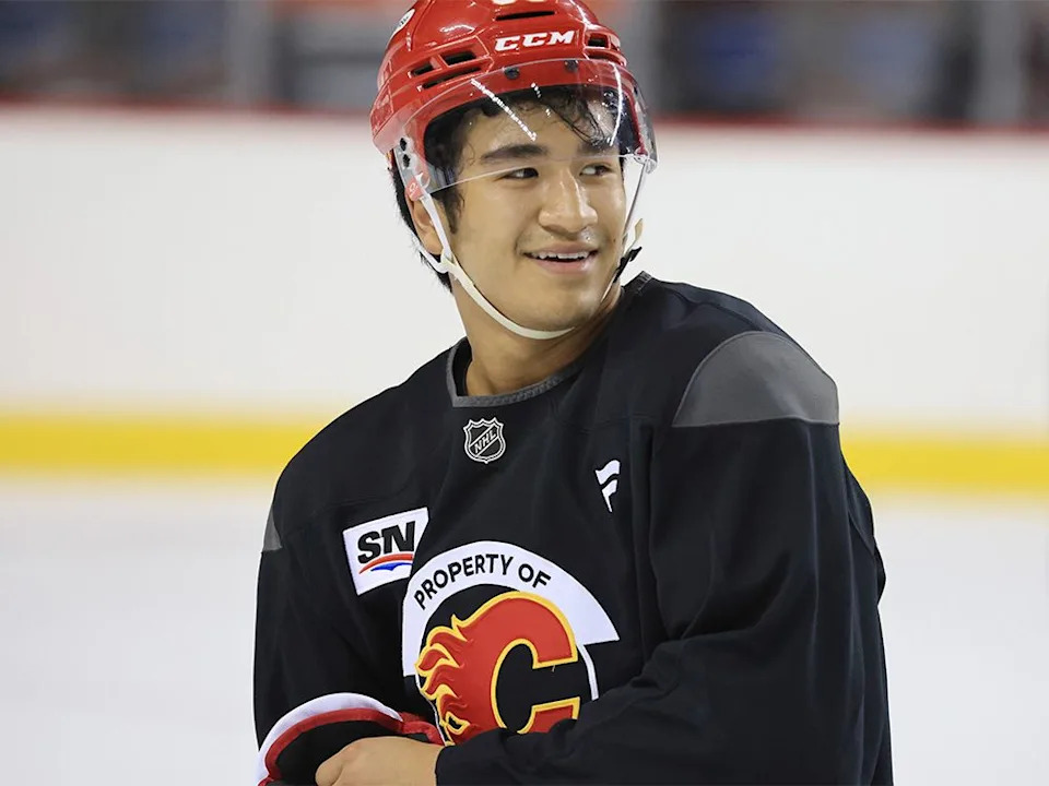  Calgary Flames defenceman Zayne Parekh smiles during the first day of training camp at the Scotiabank Saddledome on Thursday, Sept. 18, 2025.