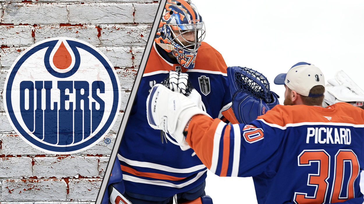 Edmonton Oilers goalies celebrating a win, with the team's logo in the background.