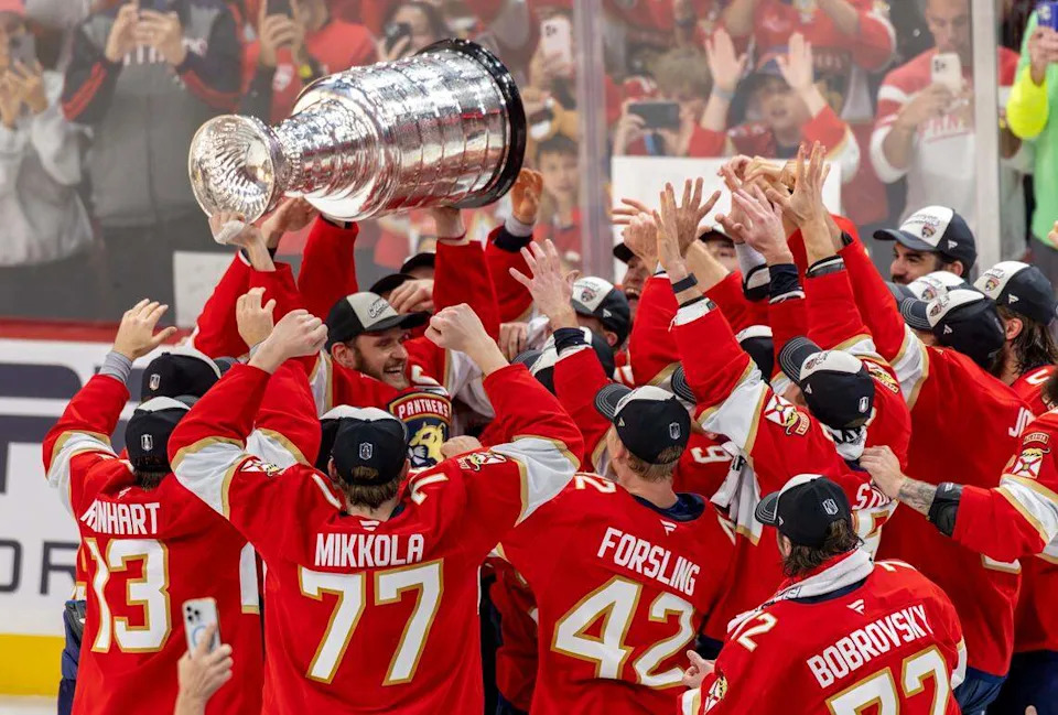 Florida Panthers center Aleksander Barkov (16) lifts the Stanley Cup with teammates after a 5-1 victory over the Edmonton Oilers in Game 6 of the Stanley Cup Final at Amerant Bank Arena on Tuesday, June 17, 2025, in Sunrise, Fla., clinching the NHL title.