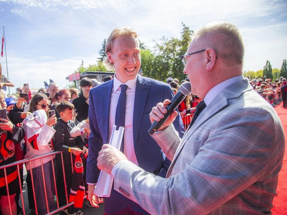 Lassi Thomson is interviewed on the red carpet Sunday at Fan Fest.