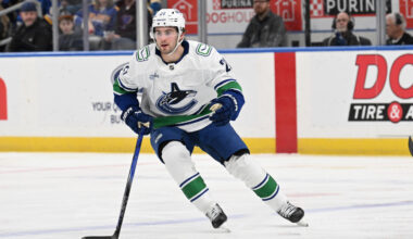 Canucks' Nils Hoglander exits pre-season game vs. Flames