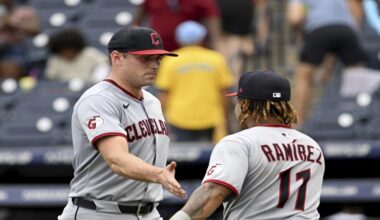 Cleveland Guardians pitcher Cade Smith, left, and José Ramírez (11) celebrate after their win over the Tampa Bay Rays in a baseball game Sunday, Sept. 7, 2025, in Tampa, Fla. (AP Photo/Jason Behnken)