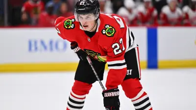 Oct 1, 2022; Chicago, Illinois, USA; Chicago Blackhawks forward Lukas Reichel (27) skates against the Detroit Red Wings at the United Center.