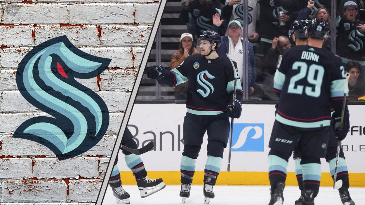 A close-up shot of Seattle Kraken players celebrating a goal as they look forward to the 2025-26 NHL season