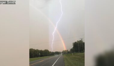 Central Florida man captures rare lightning strike through rainbow