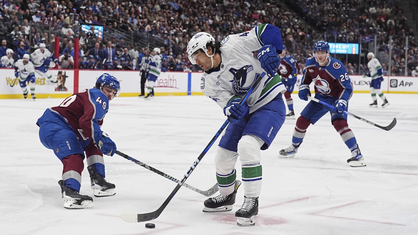 Sherwood and Joshua help Canucks win 4-1 in Avalanche's last regular-season home game