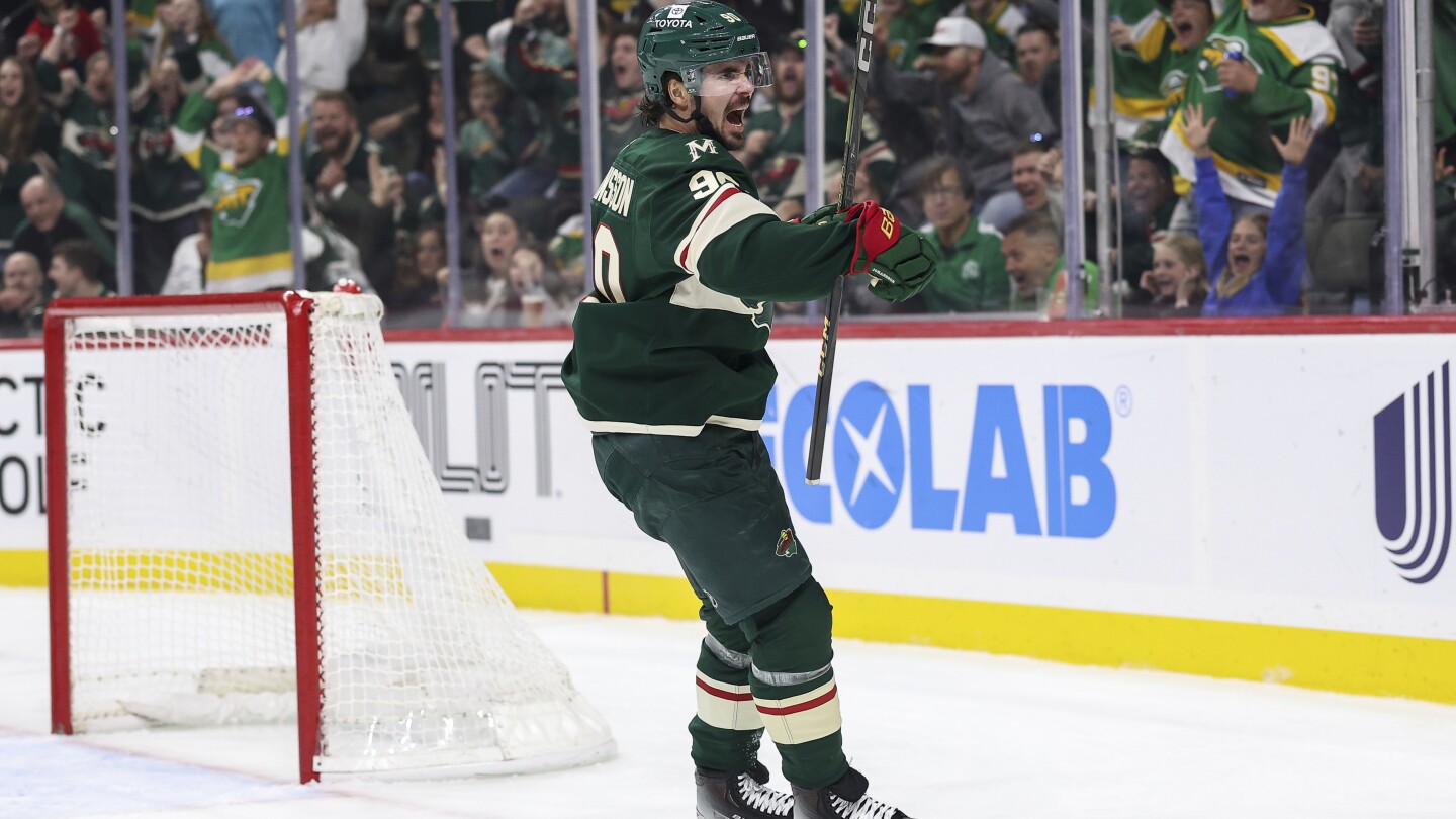 Wild clinch playoff spot by taking Ducks to OT on Eriksson Ek's tying goal with 20.9 seconds left