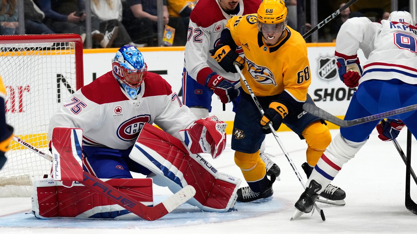 Caufield and Laine score in 2nd period to rally the Canadiens to a 2-1 win over the Predators
