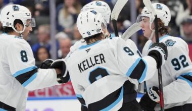 ‘Not moving at all’: NHL players walk to Leafs game as traffic snarls bus