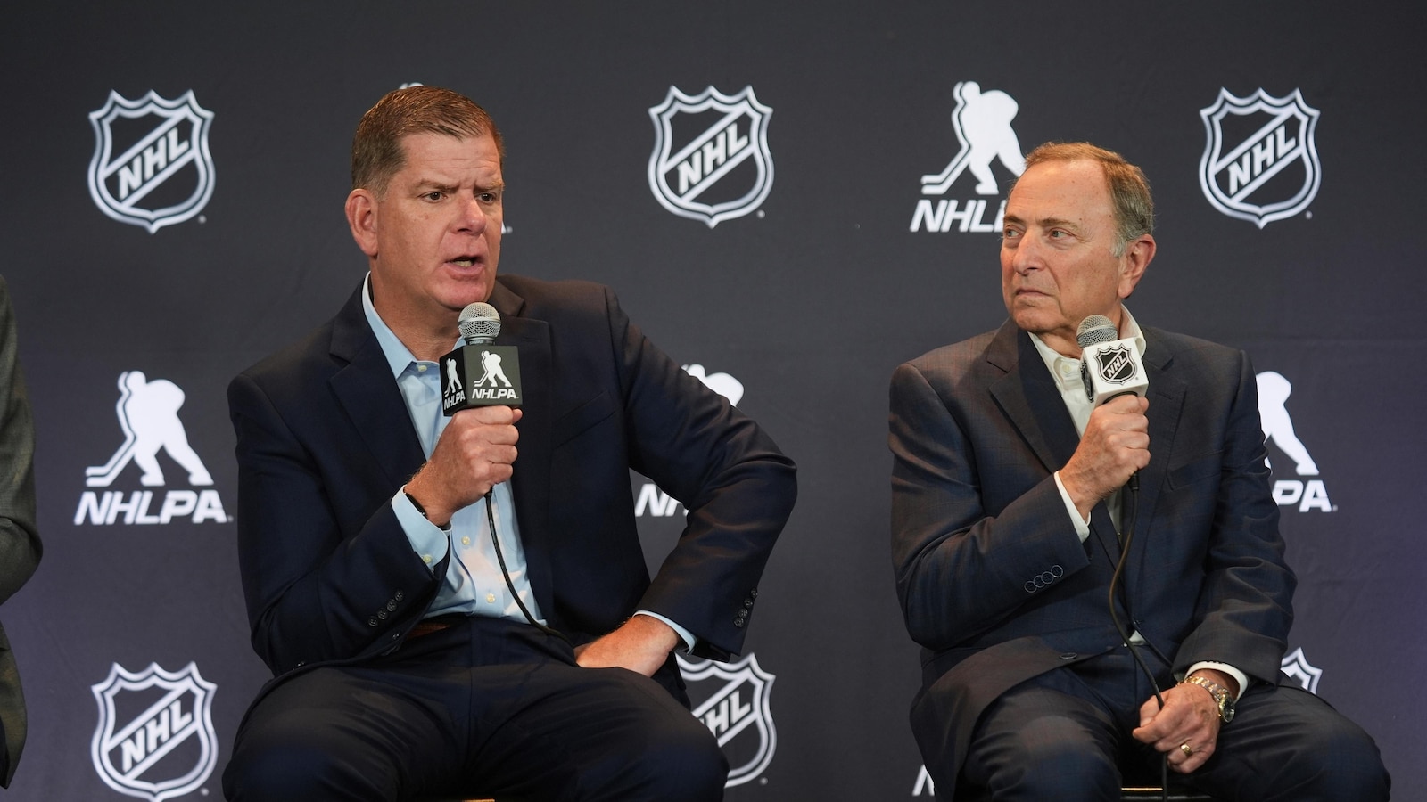 NHL to implement a playoff salary cap beginning this season, AP source says