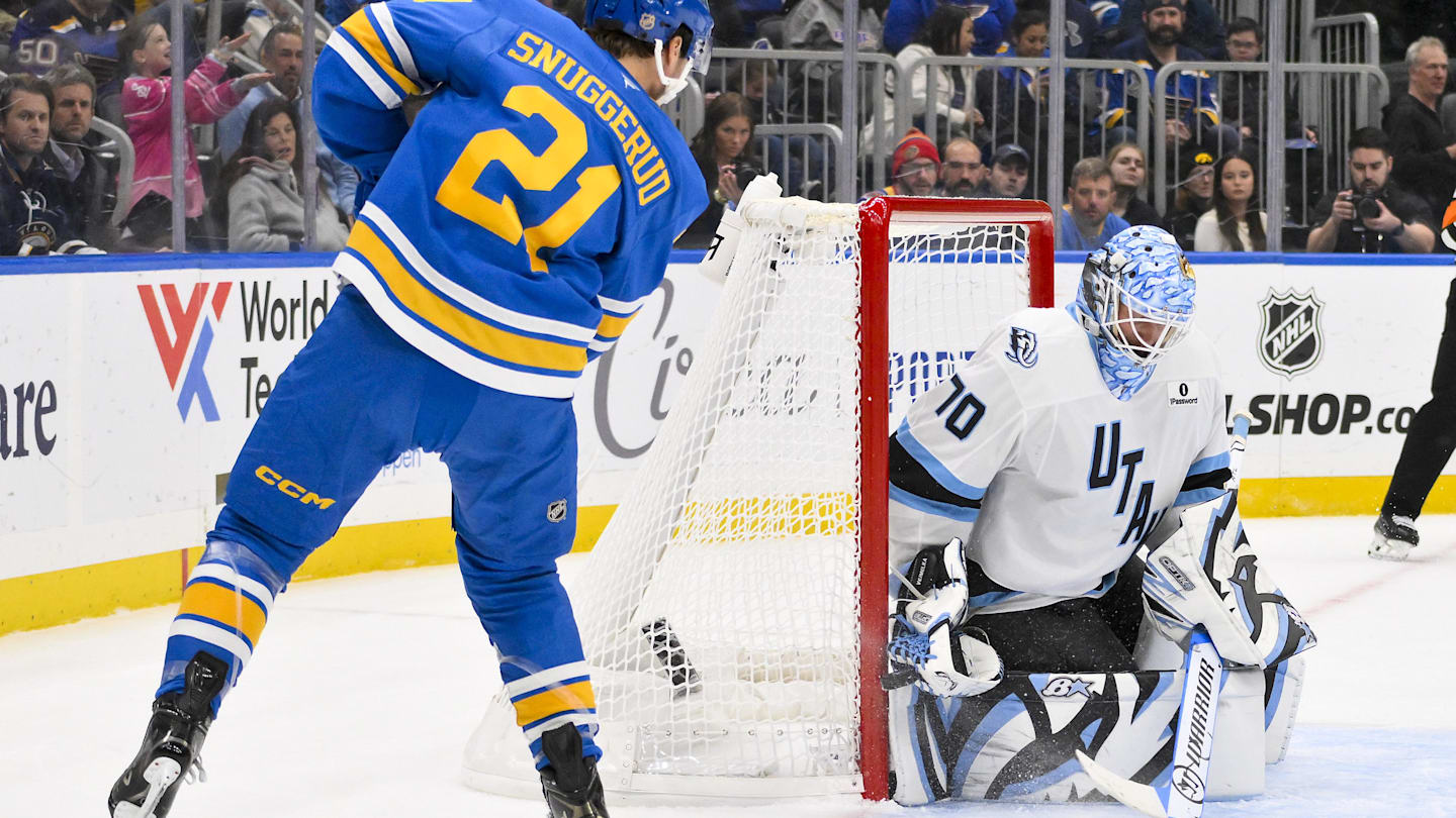 Oct 23, 2025; St. Louis, Missouri, USA; Utah Mammoth goaltender Karel Vejmelka (70) defends the net against a shot by St. Louis Blues right wing Jimmy Snuggerud (21) during the second period at Enterprise Center. Mandatory Credit: Jeff Curry-Imagn Images