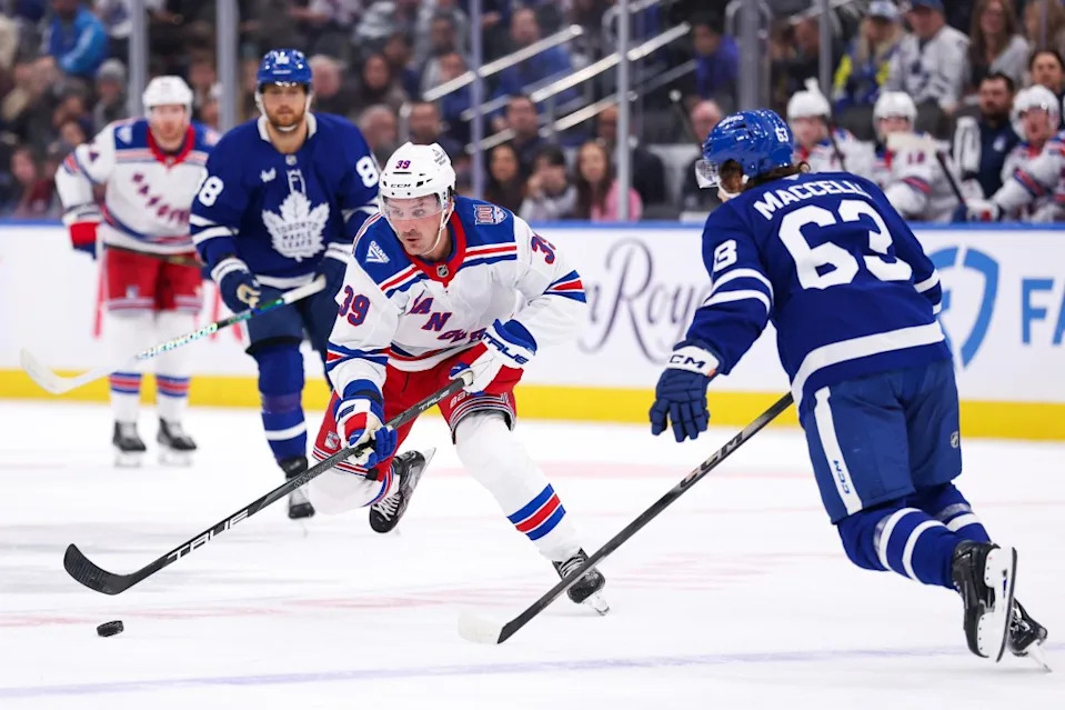 Sam Carrick #39 of the New York Rangers skates with the puck against the Toronto Maple Leafs at Scotiabank Arena on October 16, 2025 in Toronto, Ontario, Canada. NHLI via Getty Images