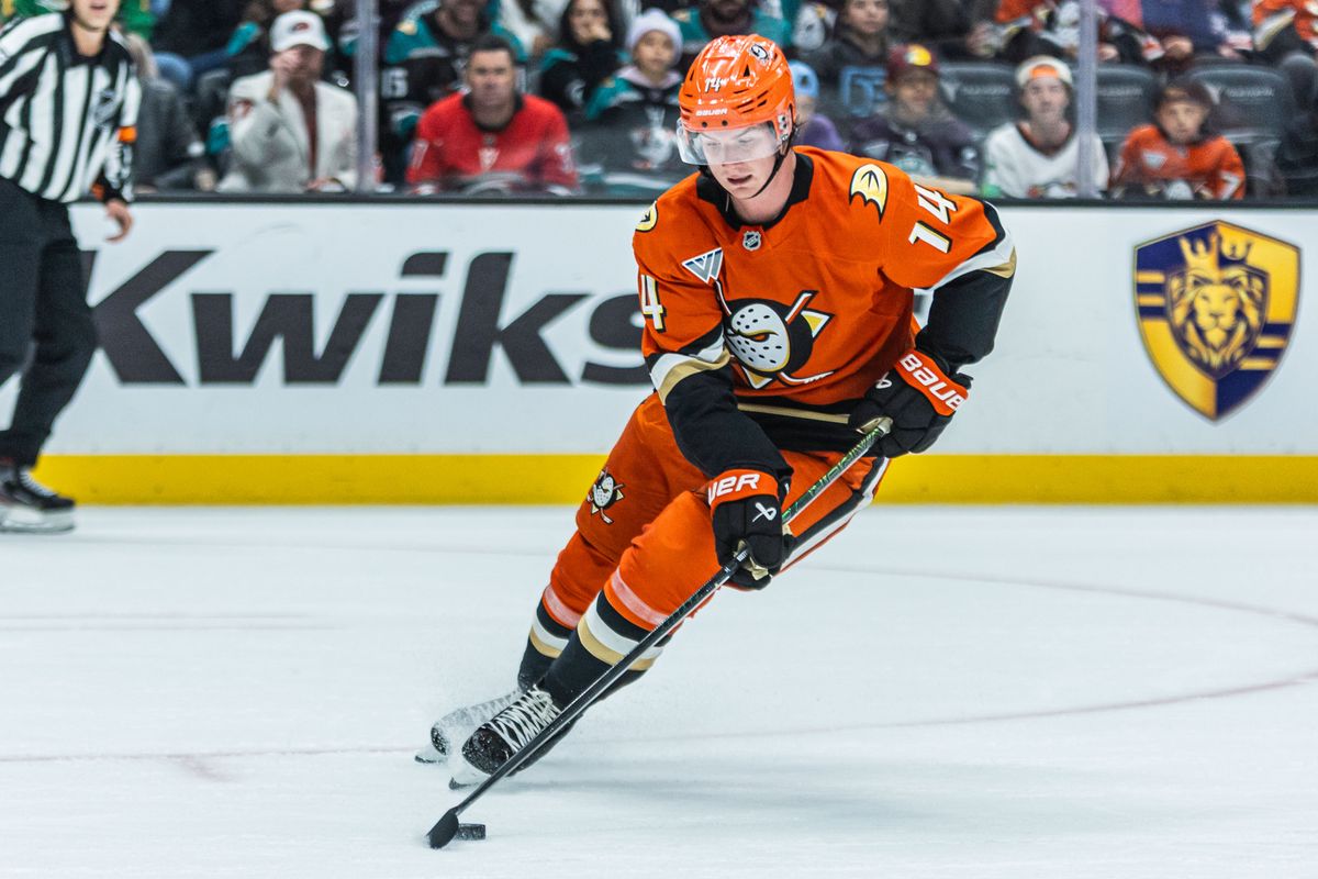 Anaheim Ducks D Drew Helleson (14) moves up the puck during an NHL game against the Carolina Hurricanes on October 16, 2025 in Anaheim, CA.