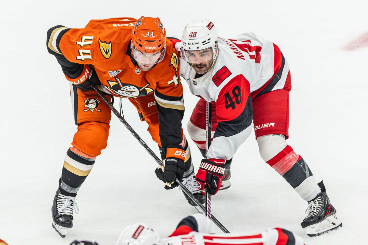 Carolina Hurricanes L Jordan Martinook (48) and Anaheim Ducks L Ross Johnston (44) waits for the puck to drop during an NHL Carolina Hurricanes against the Anaheim Ducks game on October 16, 2025 in Anaheim, CA.