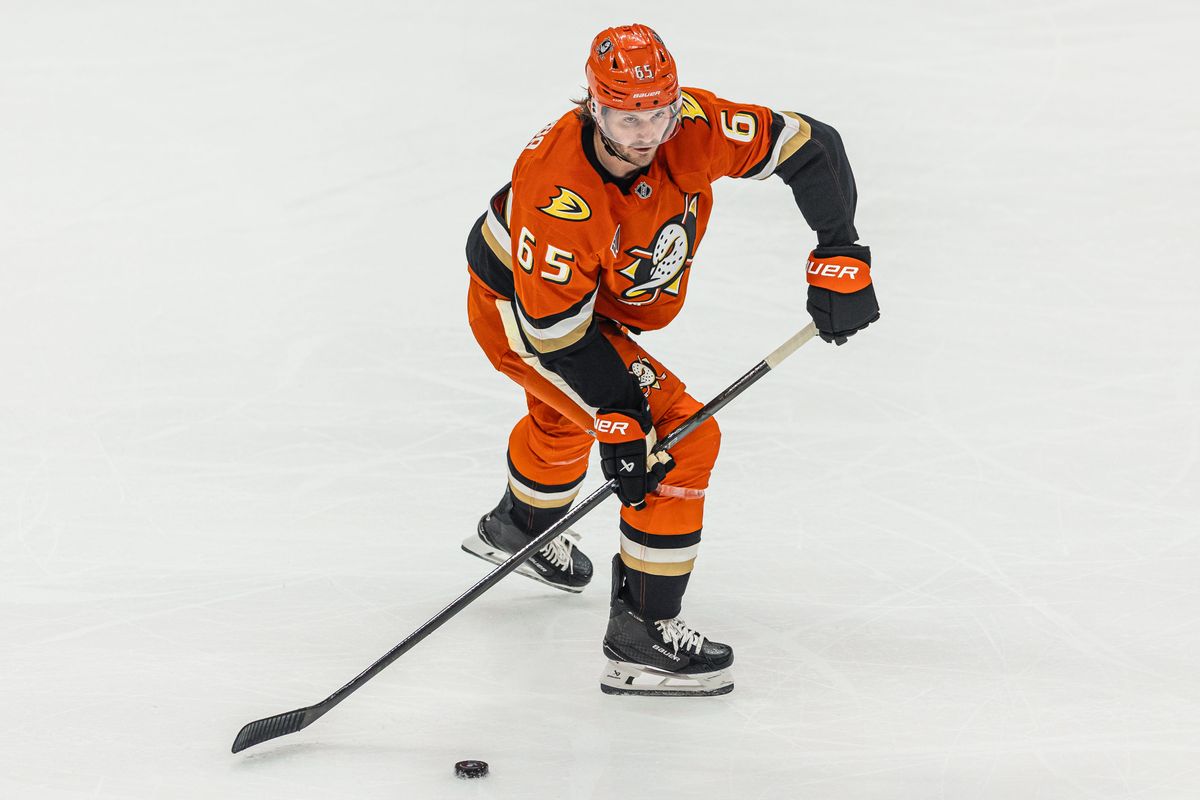 Anaheim Ducks D Jacob Trouba (65) looks to pass the puck during an NHL game against the Carolina Hurricanes on October 16, 2025 in Anaheim, CA.