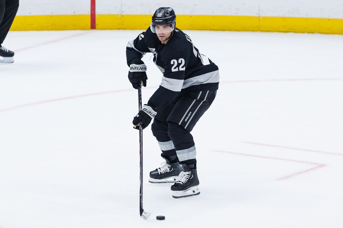 Los Angeles Kings LW Kevin Fiala (22) looks to pass the puck during an NHL game against the Carolina Hurricanes at the Crypto.com Arena on October 18, 2025 in Los Angeles, California.