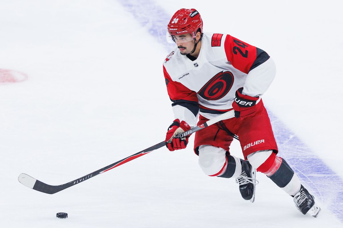 Carolina Hurricanes C Seth Jarvis (24) skates up with the puck during an NHL game against the Los Angeles Kings at the Crypto.com Arena on October 18, 2025 in Los Angeles, California.