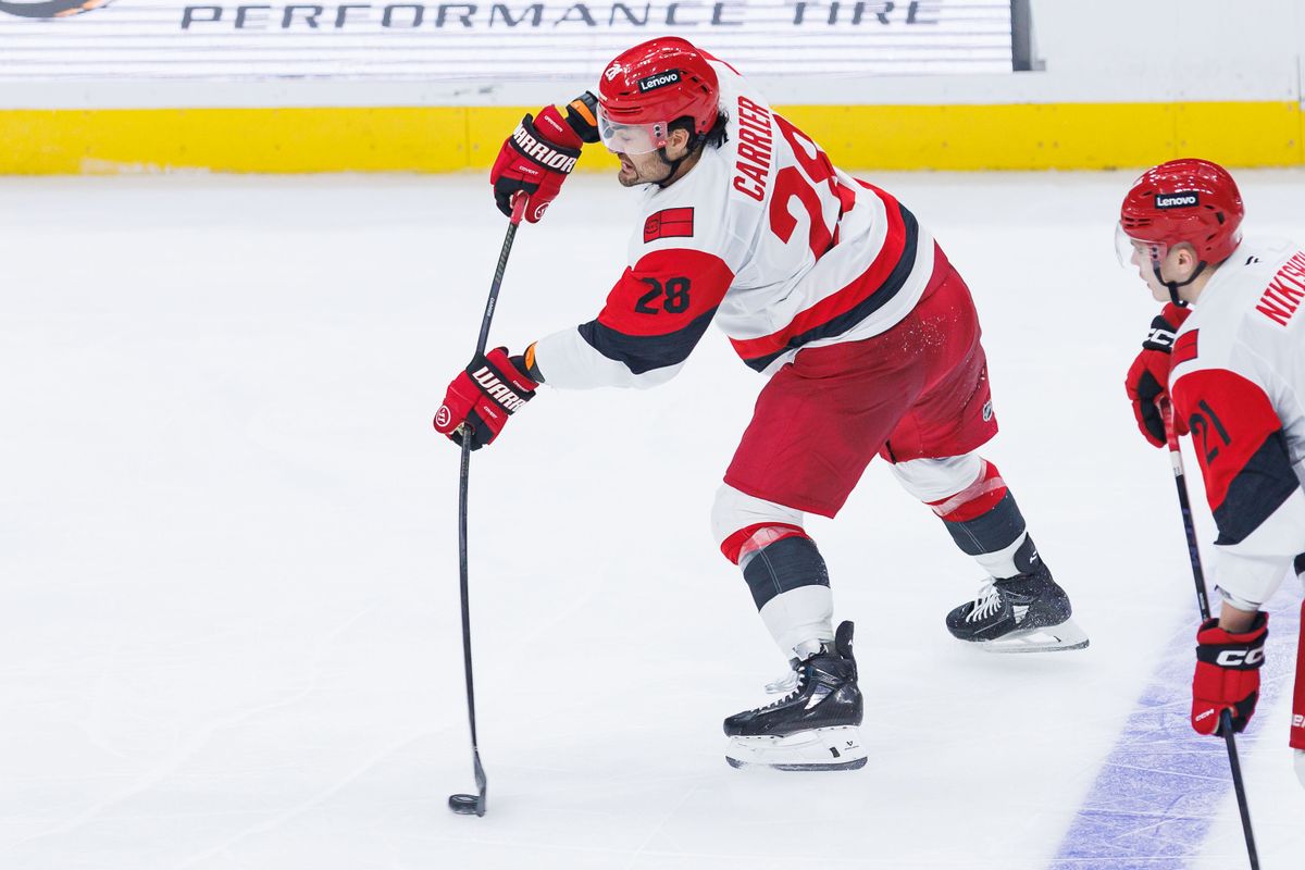 Carolina Hurricanes LW William Carrier (28) shoots the puck during an NHL game against the Los Angeles Kings at the Crypto.com Arena on October 18, 2025 in Los Angeles, California.