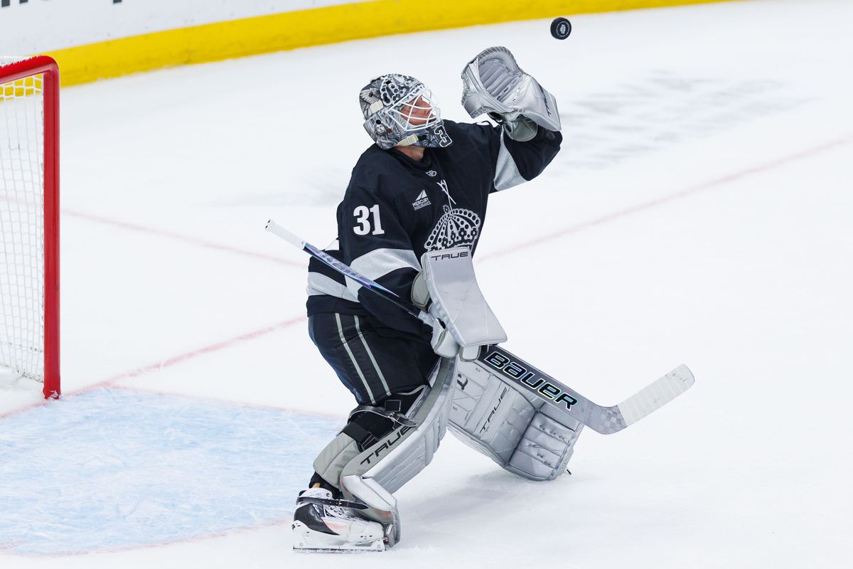 Los Angeles Kings G Anton Forsberg (31) catches the puck during an NHL game against the Carolina Hurricanes at the Crypto.com Arena on October 18, 2025 in Los Angeles, California.