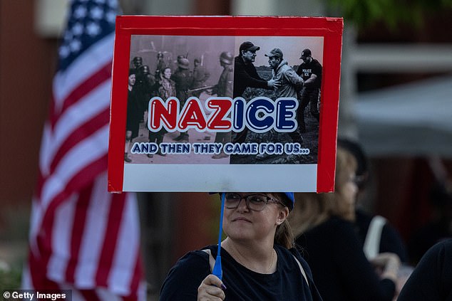 Outside LA in Riverside, an anti-ICE protestor is seen displaying a personalized sign