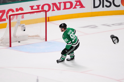 FILE - A hat is thrown onto the ice as Dallas Stars