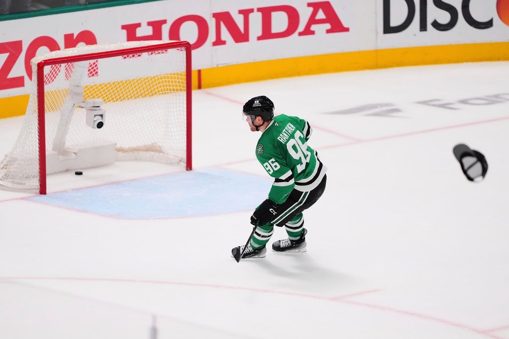FILE - A hat is thrown onto the ice as Dallas Stars