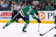 Dallas Stars left wing Jason Robertson (21) fires a shot towards goal during the first...