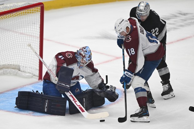 The Kings’ Kevin Fiala (22) gets a shot on goal...