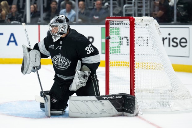 The puck shot by Colorado Avalanche center Martin Necas goes...