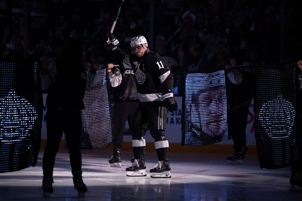 Kings center Anze Kopitar (11) is introduced to a rousing...