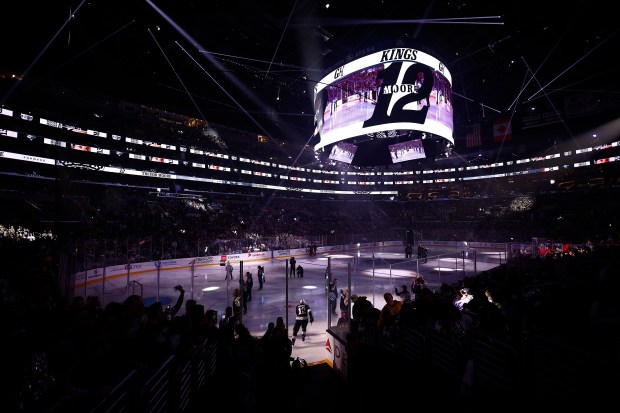 The Kings’ Trevor Moore (12) is introduced before their season...